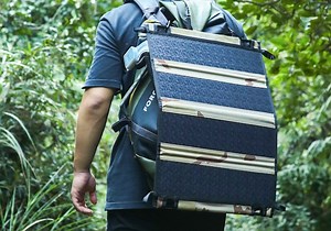 Portable folding solar panel doubles as a table