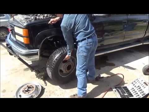 How to change front brake calipers and rotors on a GMC or Chevy 4x4 Dually