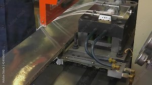 Equipment for the production of electrical network plugs. Production of forks on injection molding machine. Production of modern electric plug. close-up of male hand holding electric plug