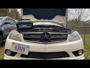 How do you replace the battery of the Mercedes C-Class?