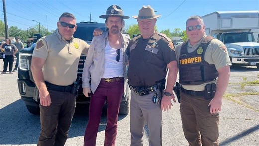 Ethan Hawke pictured switching hats with Oklahoma trooper while shooting 'The Lowdown'