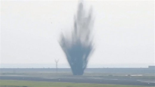Hidden runway bomb explodes just after plane takes off