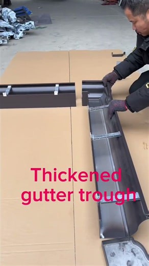 Metal gutter and downpipe installation video.