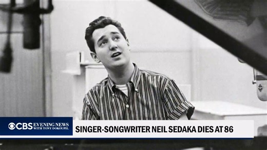 Neil Sedaka, the prominent singer-songwriter whose string of hits in the 1960s and '70s included "Laughter in the Rain," "Breaking Up is Hard to Do" and "Calendar Girl," has died. He was 86. https://cbsn.ws/4l5JLji | CBS Evening News