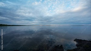 Time-lapse of clouds over the reservoir of Lokka in Lapland, Finland