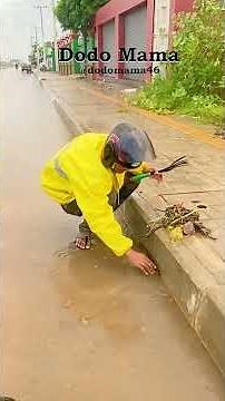 Restoring Flow Clearing a Trash Filled Street Drain