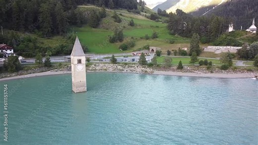 The iconic submerged Church Tower of Graun, Lake Reschensee, Italy