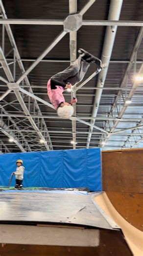 Mastering the Backflip on a Scooter at the Skatepark