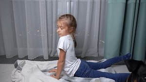 Young Girl Engages Playful Acrobatics On Stock Footage Video (100% Royalty-free) 3667616223 | Shutterstock