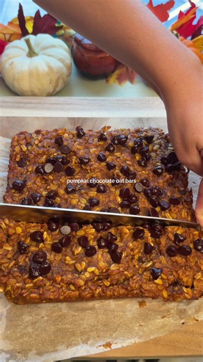 Pumpkin Chocolate Oat Bars 🎃🍁🍂 Ingredients: Pumpkin Bread Oat Bars: 15 oz pumpkin purée 2 eggs 1 cup peanut butter butter ¾ cup maple syrup 2 tsp vanilla 3 cups oats 1 tsp cinnamon 2 tsp pumpkin pie spice 1 tsp salt 1 tsp baking powder 1 cup chocolate chips Recipe: Combine all went ingredients in a large mixing bowl. Mix. Add in the oats and seasonings and mix. Then add in 3/4 cup of the chocolate chips. Mix one last time. Place the mixture in a 8x8 baking dish lined with parchment paper. Eve