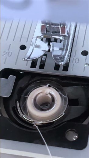 Inserting Bobbin: Singer 4423 Sewing Machine