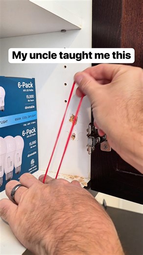 I use a rubber band to help tighten stripped screws #homediy #tooltips #rubberband #cabinetrepair | Liz & Jeff