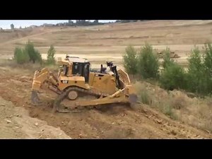 Caterpillar D8T pushing