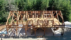 Flying over a party barn frame. www.frameworktimberframes.com * * * #timberframe #pavilion #trusses #woodworking #timberframes #deck #patio #handcrafted #backyardliving #outdoorliving #mortiseandtenon #dreamhome #timberhomeliving #timberhome #timberframelove #rusticliving #timber #frameworkplus #timberframehouse #timberframehomes #timberframed #woodworkingskills #woodworkingcommunity #timberframing #processvideo #inprogress #build #construction | Frame Work Plus, Inc