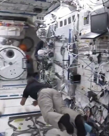 Astronaut Koichi Wakata showing his mastered solo baseball on the International Space Station (ISS)