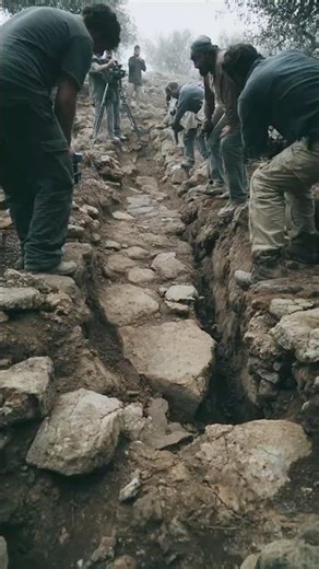 Ground Fracture Reveals Stone Path Hidden Beneath Soil