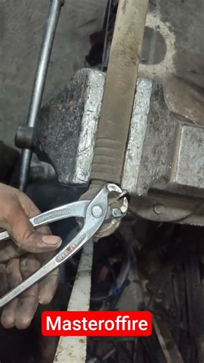 “Removing the heavy-duty ball joint safety pin that locks the spring and prevents loosening