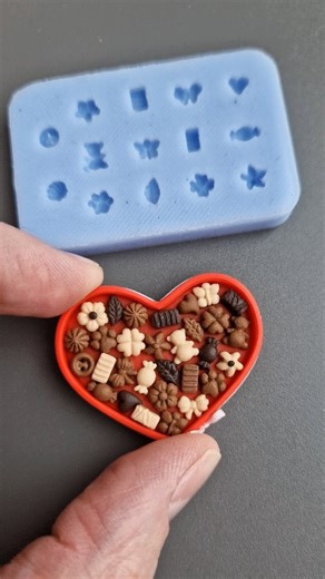 Svitlana Pavlova/Kharkiv💙💛 on Instagram: "Hello dear friends! I present to you our new product - a mold for candies in a scale of 1:12 (candies 4-6 mm in size). I recommend using very soft clay so that all the small details are well imprinted. I use polymer clay Fimo in the colors: chocolate, champagne and caramel. I made the models for the candies, and my colleague Julia made a model for casting from silicone. The mold is already available for order in the store: https://sweetminidollhouse.et