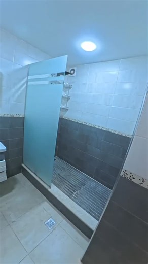 ZackGyver on Instagram: "No electrical outlet for a washing machine in this bathroom. I pulled a cable from an existing socket, ran it in surface trunking over the tiles, passed through the plasterboard false ceiling, then came back down to install a waterproof outlet. #electrician #bathroomrenovation #homeimprovement #washingmachine #diy"