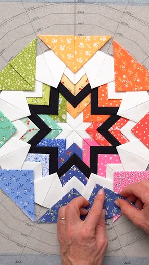 Join Jen as she shares how to make this stunning Folded Star Table Topper designed by PlumEasy. The center fabrics combine to create a mesmerizing “kaleidoscope”, surrounded by layers of prairie points in coordinating fabrics. Watch the full tutorial: https://www.shabbyfabrics.com/free-downloads-and-video/790 | Shabby Fabrics