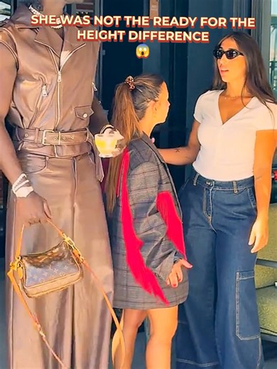 She wasn't the ready for the height difference 😱 #presence #TallMan #HieghtDifference #Reaction #Fyp
