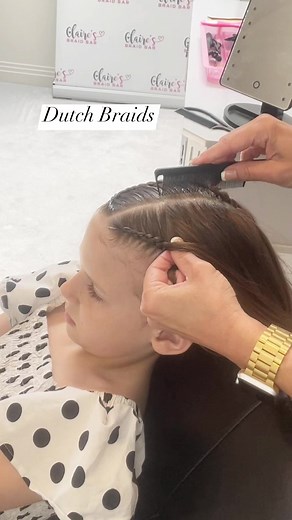 Love this cute Half up- Half down Dutch Braid style 💕...... #schoolhairstyles #trenzastyle #schoolhair #dutchbraids #dutchbraid #braidtutorial #tranças #partyhair #hairstylesforgirls #peinados #hairtutorial #hairreels #halfuphalfdownhairstyle #hairvideo #girlshairstyles #nagô #braidsforgirls #braidsofinstagram #hairideas #hairtutorial #hairtutorials #braidstyles #braidedhairstyles #braidideas #penteados #peinadosparaniñas #braidinspo #trenza #partyhairstyle | Claire’s Braid Bar