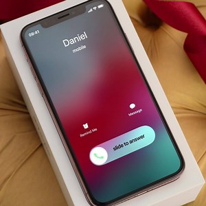 999K views · 2.7K reactions | Some gifts are more than just a gift. Let them unwrap the iPhone Xs. | John Lewis & Partners | Facebook