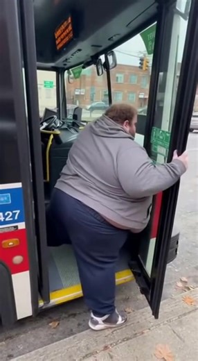 The man was so fat that he got stuck in the bus door. | The Flying Pig