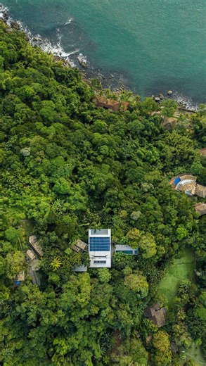 architecture & design hunter on Instagram: "Sahy Residence is a summer house in the Atlantic Forest that reinterprets 1980s structures through a modular timber system, integrating architecture, landscape, and bioclimatic strategies in a contemporary and sensitive way. _project: Sahy Residence _architecture: Andrade Morettin Arquitetos Associados @andrademorettin _interiors: Studio Mellone @studiomellone _project management: Canal & Musse @canalemusse _landscape design: RPAA Paisagismo @rpaa.pais