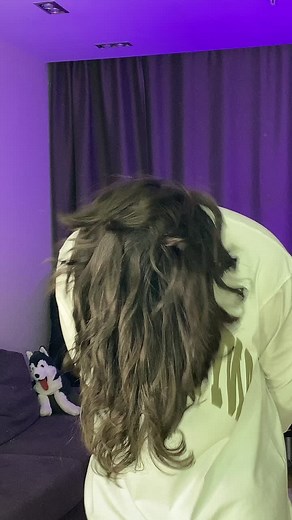 Hair Styling Tips with Long Wavy Hair in Unique Lighting