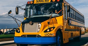 The first US-made LionC zero-emission electric school bus rolls off the factory line in Illinois