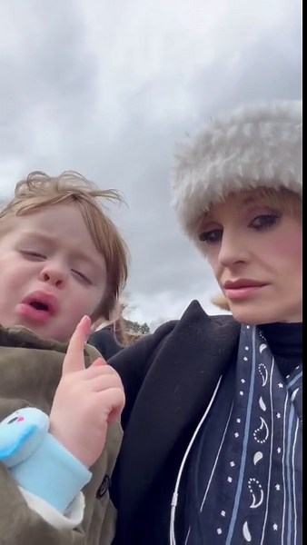 WATCH: Kelly enjoys a day out with her son