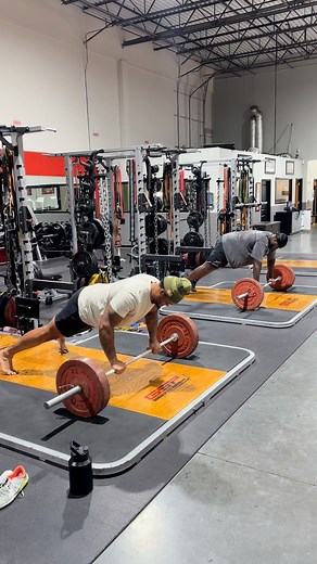 NFL athletes Elijah Wilkinson and Carter Warren crushing this. The anti-rolling barbell pushup is one of my favorite pushup variations for correcting form since it requires the lifter to engage their lats & core while staying tall & on top of the bar rather than sagging behind. It also reinforces 90 deg joint angles. More in my FREE book at https://www.advancedhumanperformance.com/movement-redefined-fundamentals #pushupchallenge #pushupseveryday #coreworkout | Advanced Human Performance by Dr. J