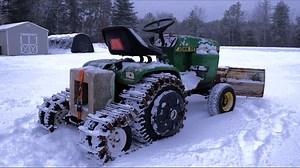 [搬] isavetractors 约翰迪尔317 hallf轨道清雪_老式花园拖拉机_无人机航拍镜头