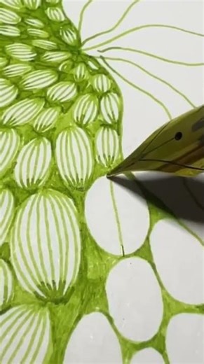 a person is painting clothes material with neat painting