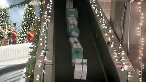 Airline Santa surprises travelers with gifts