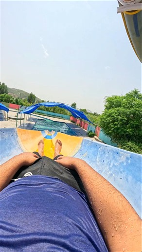 Attempted a bottle flip on the giant water slide edge and dropped it! 🇺🇸 #Shorts #Flip #Fail #Slide