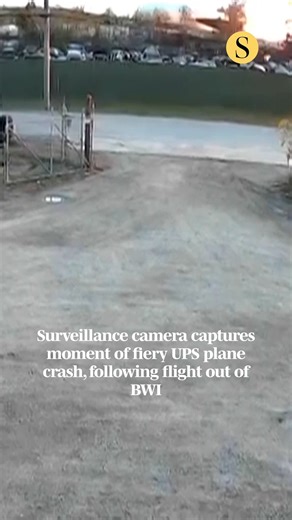 About 12 hours before its left engine detached during takeoff, the UPS cargo plane that fatally crashed in Kentucky had made its last successful flight out of Baltimore. Surveillance footage from a nearby truck parts business caught large flames and plumes of smoke as the plane hits the ground. 🎥: Kentucky Truck Parts, Associated Press | The Baltimore Sun