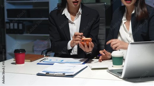 project manager working overtime on startup planning, updating progress milestones, and collaborating with investors for business success.