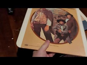 Loading and playing a CED on an original RCA Selectavision player.