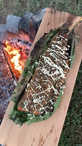 Leaning salmon | Over The Fire Cooking by Derek Wolf