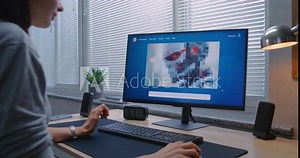 Adult woman in headphones enters text in AI image generator app on PC. Advanced artificial intelligence chatbot generate detailed image portrait of sci-fi robot. From text prompt to generated photo.