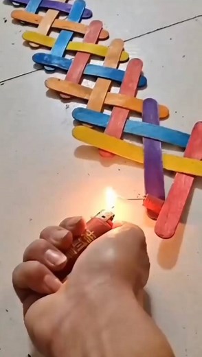 Viral engineering® (110|K🎯) on Instagram: "Popsicle Stick Chain Reaction 🍡 The key to the Popsicle Chain Reaction comes from potential and kinetic energy. As you weave the popsicle sticks together, you are continually building potential energy. Each popsicle stick is bent over the stick before it and pinned under the stick before that, creating tension in the wood. When you finally have the chain length that you want, you let go and all of the tension and potential energy is released in a chai