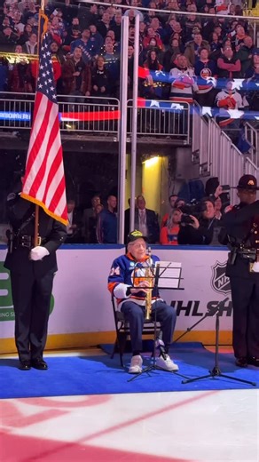 192K views · 91K reactions | 104 year old World War 2 Veteran Dominick Critelli performed the National Anthem on the saxophone at tonight’s game! | New York Islanders | Facebook