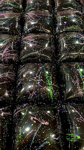 Victoria Dzierza on Instagram: "🎨 SPLATTER PAINTED BALLOON WALL 🎨 I was 1000% certain I would have issues with painting this balloon wall. I even painted a few extra squares at midnight the night before the event. Luckily they were not needed. The neon paints worked like a charm and it looked amazing in the end. I don’t know what it is but I could watch time lapse reels of the @tuftexballoons square balloon walls being inflated all day. Its just so satisfying! I used the @premiumconwin foil pr