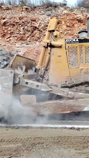 Cat D10T short video This machine is very powerful and has a large stone in its path.#cat #short