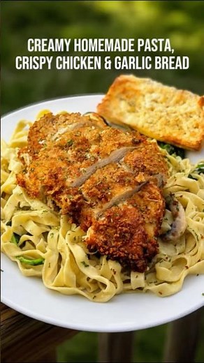 Parmesan Crusted Chicken over Creamy Spinach Mushroom Pasta