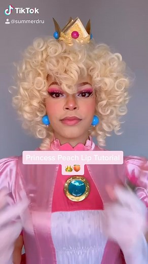 Summer Dru on Instagram: "Here’s my Princess Peach Lip Tutorial! I had so much fun cosplaying her again 🥺! A few people on tik tok asked so I’m gonna go ahead and post it on here as well :) also wanted to say thanks for 130k on there 🥺 I appreciate all the support it means sm 🥺💗!! #princesspeach #princesspeachcosplay #nintendo #mario"