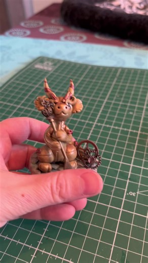 making the second steampunk dragon a little one with a fork 🥰 there will be 2 more #dragon #steampunk #dragons #clay #polymerclay