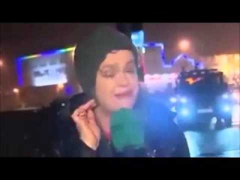 Woman (Reporter) hit by a Stop sign